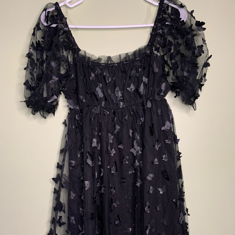 Chic Black Dress with Butterfly Details